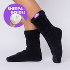 The Foozie™ Move in Black, side view on foot with a 'Sherpa inside' badge showing the lining