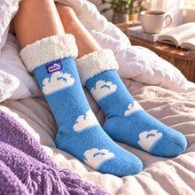 Load image into Gallery viewer, The Foozie™ Cloud slipper socks, on a cosy duvet
