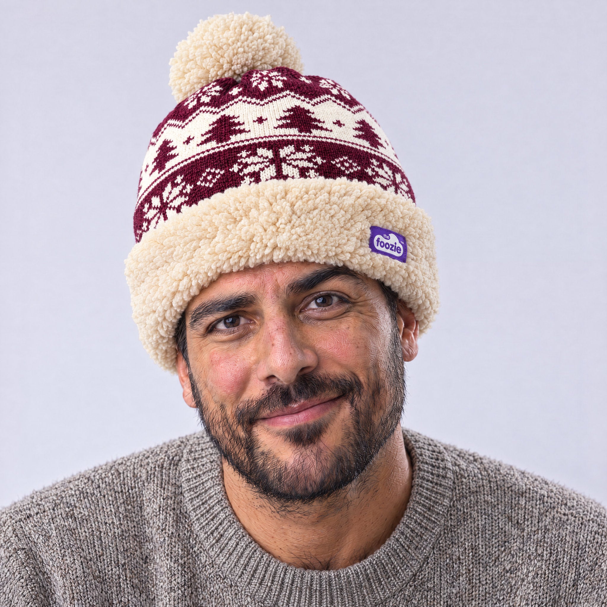 The Foozie™ Nordic Christmas Beanie, worn by a man