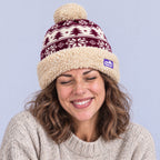 The Foozie™ Nordic Christmas Beanie, worn by a woman