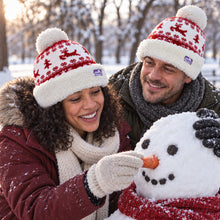 Load image into Gallery viewer, The Foozie™ Reindeer Christmas Beanie, building a snowman
